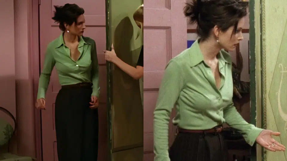 green polo shirt black wide leg trousers