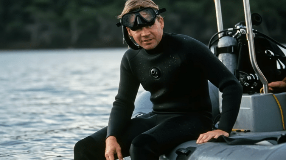 Steve Irwin on a boat in a wetsuit on the day of the incident.