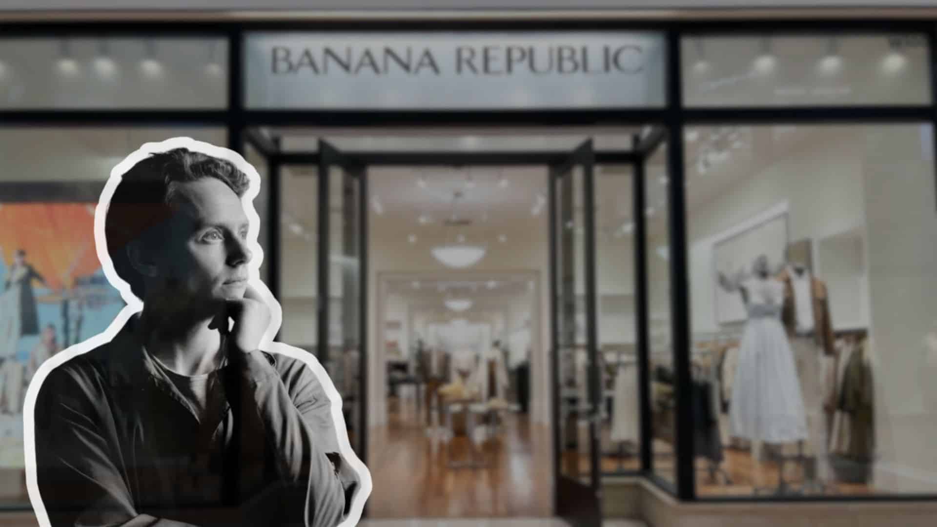 Thoughtful man in foreground with blurred Banana Republic store interior background