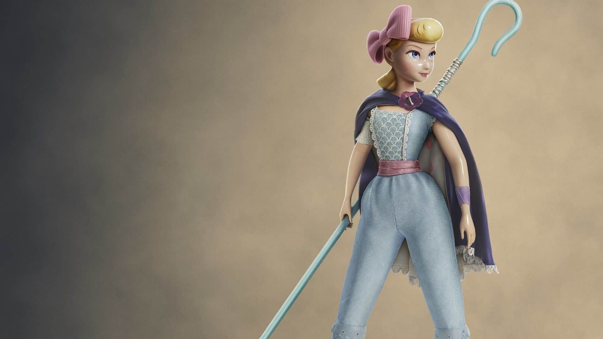 Bo Peep from Toy Story standing confidently with her shepherd’s crook, wearing a blue outfit and purple cape.