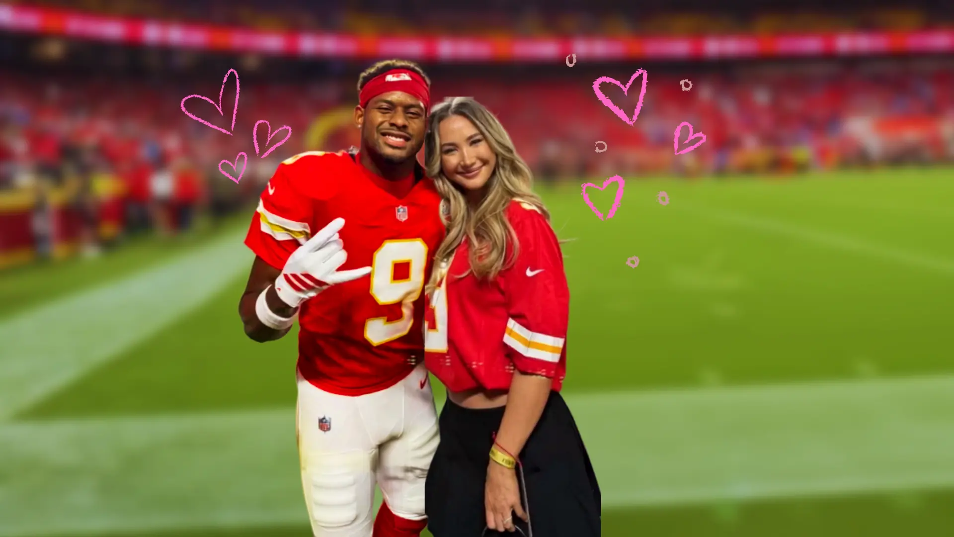 JuJu Smith-Schuster and Laura Kruk posing together on a Kansas City Chiefs football field with pink heart graphics.