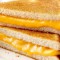 April 12 = National Grilled Cheese Day! Grill Yours Up with a Bit of Sass + Spice!